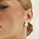 Boucles d’oreilles à deux perles shell