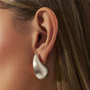 Boucles d’oreilles goutte courbée lisse – Grand format